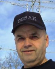 Add your one line caption using the Image tab of the Web Properties dialog